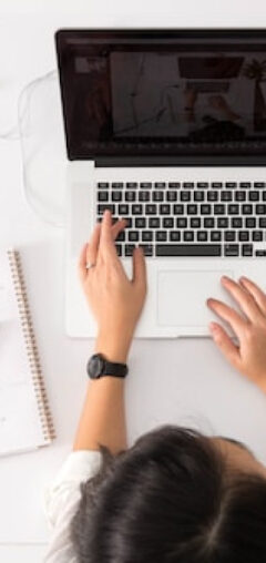 Woman using an iPaaS application - Tall Content Card Image